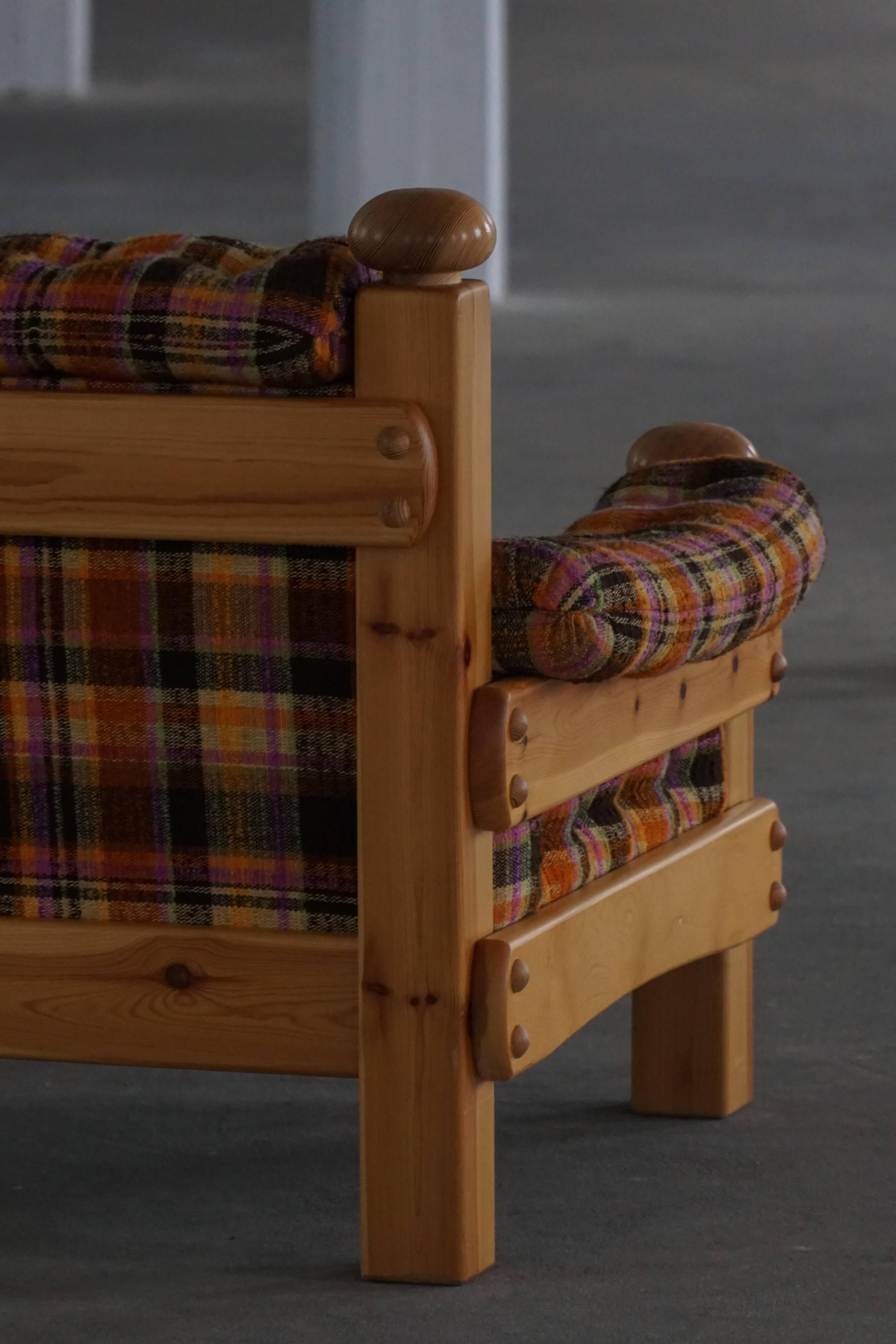 Brutalist lounge chair in solid pine, Swedish modern, made in the 1970s.