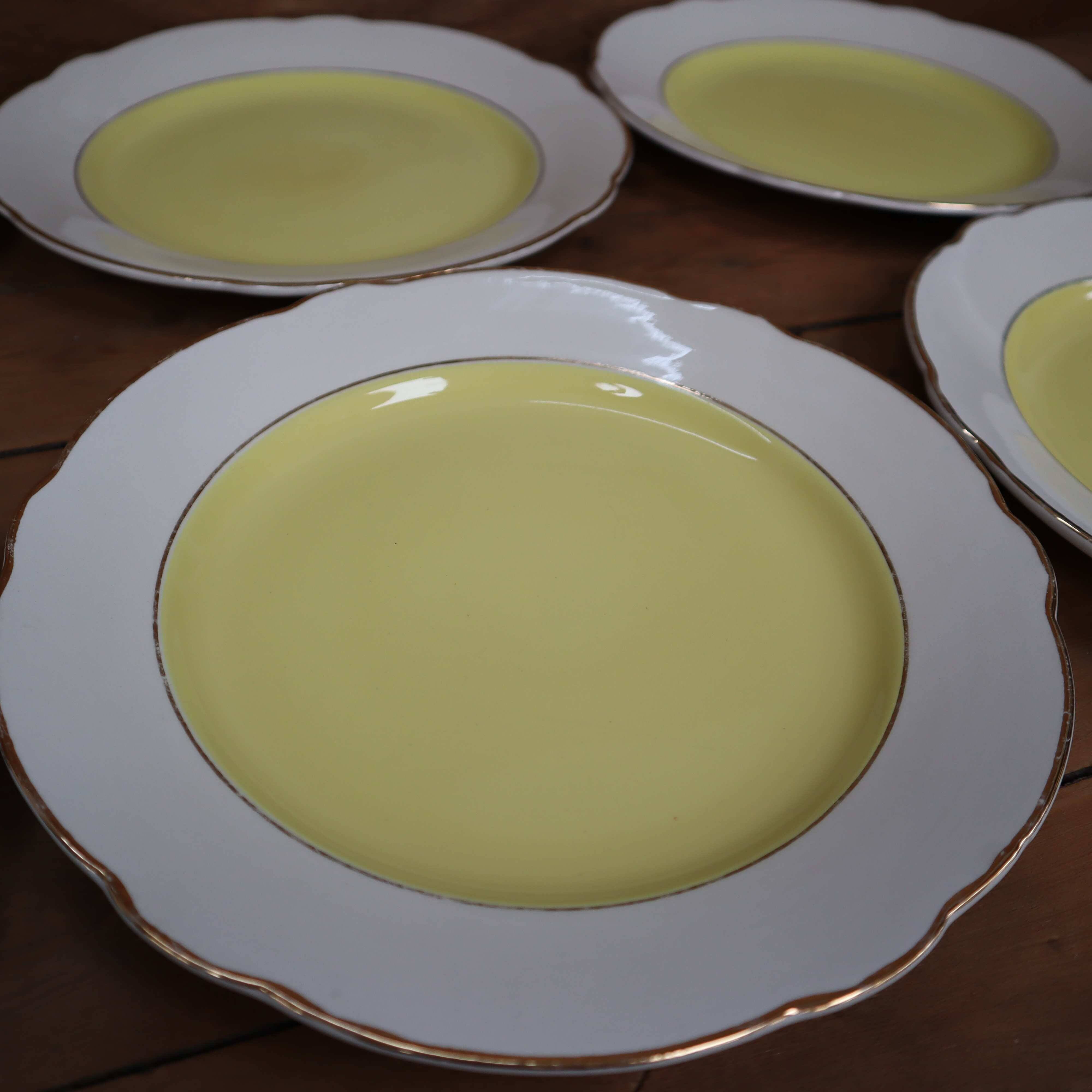 Set of 8 KG Lunéville yellow and white flat plates