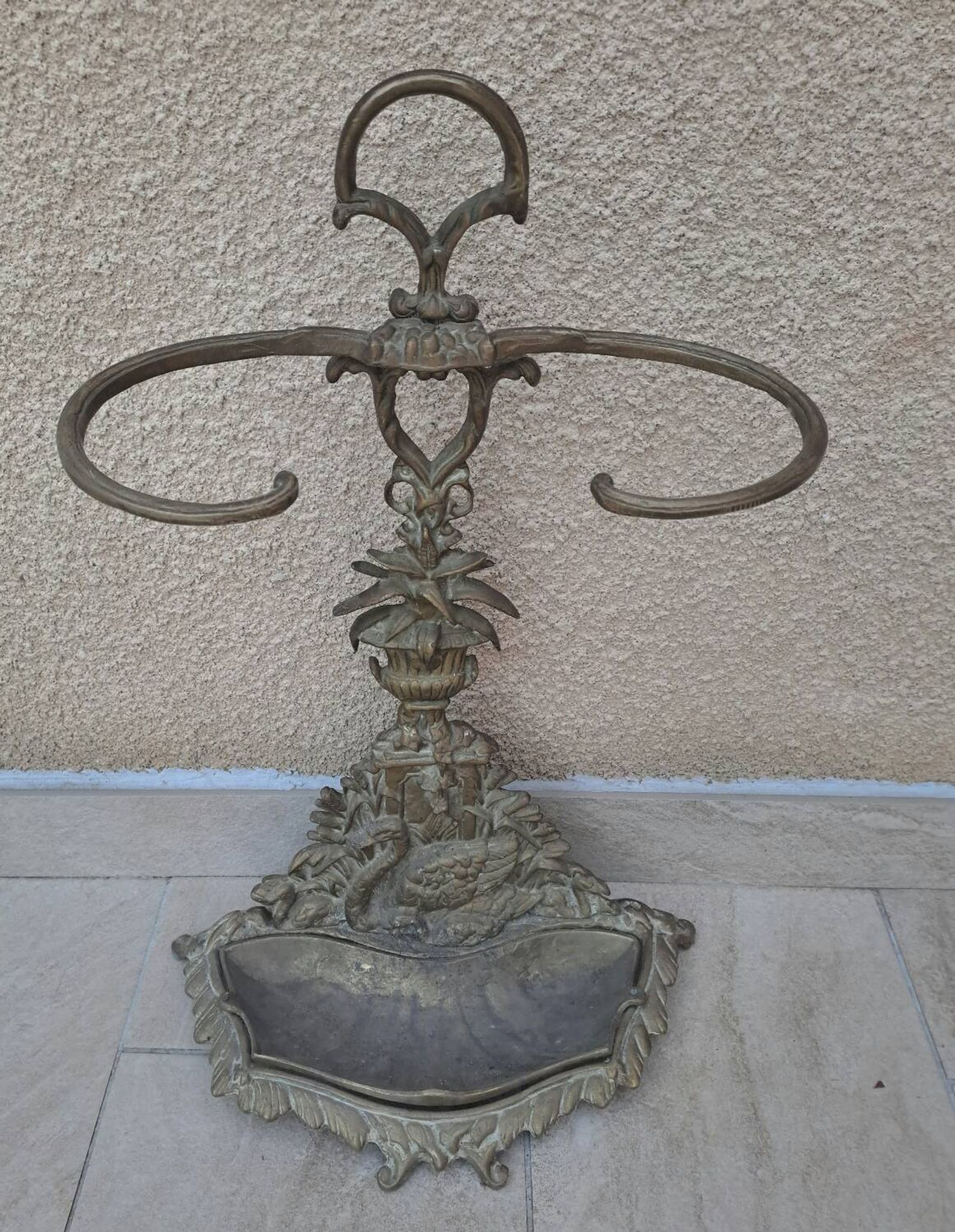 Bronze and brass umbrella stand decorated with a swan