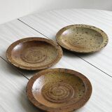 3 rustic stoneware plates, brown and beige speckled finish.