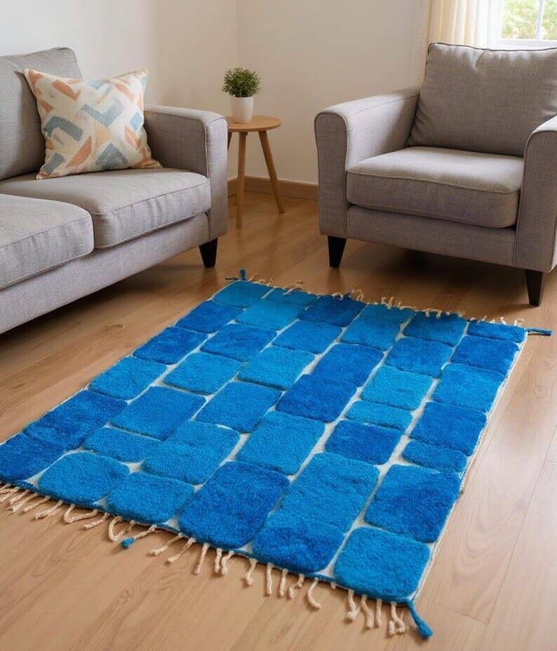 Handmade traditional pure wool carpet with blue patterns.