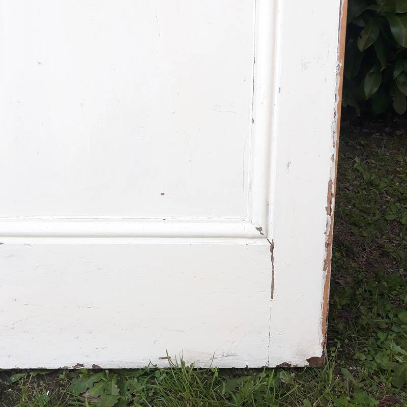 Communication door H220xW80.5cm, old panelled with moulding.