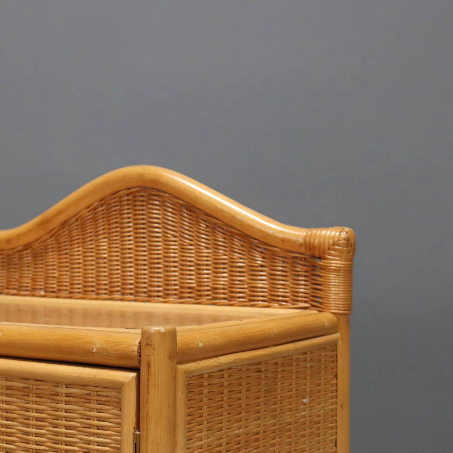 Pair of woven wicker bedside tables from the 1980s.