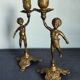 Set of two cherub cherub candlesticks