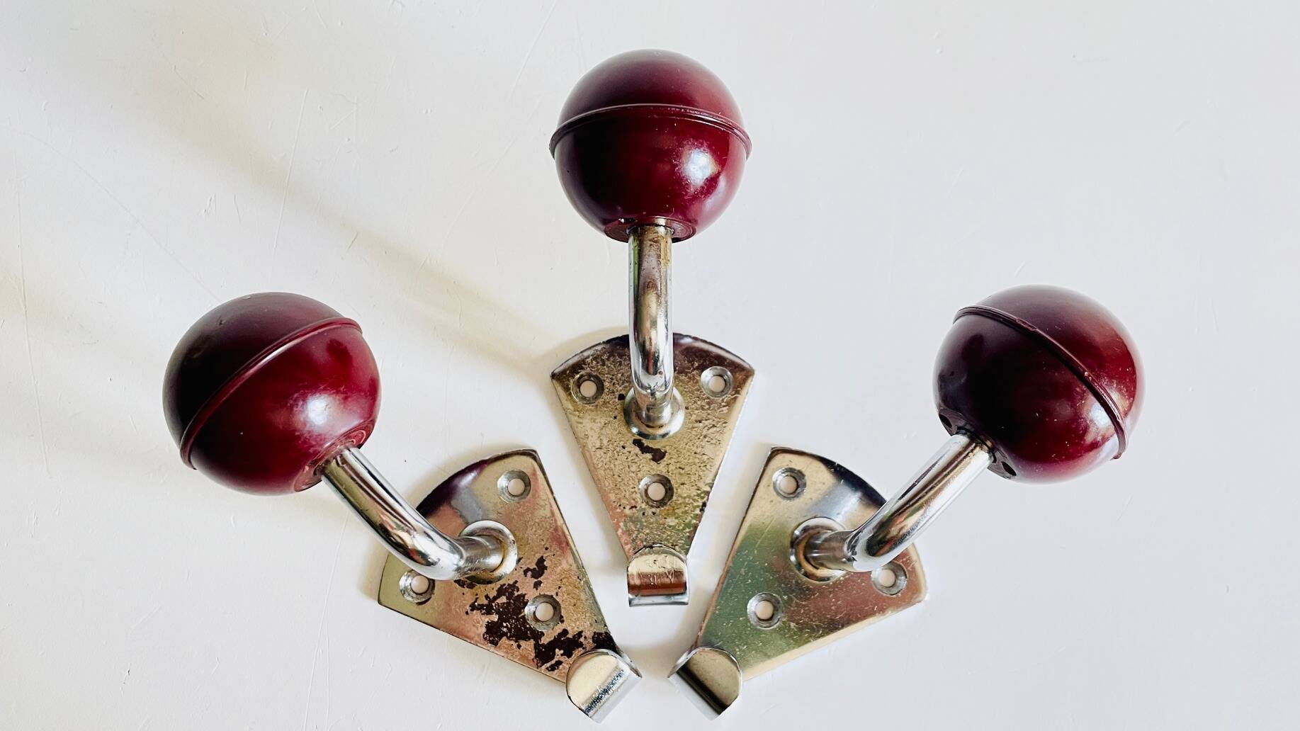 Chrome and bakelite coat hooks from the 70s
