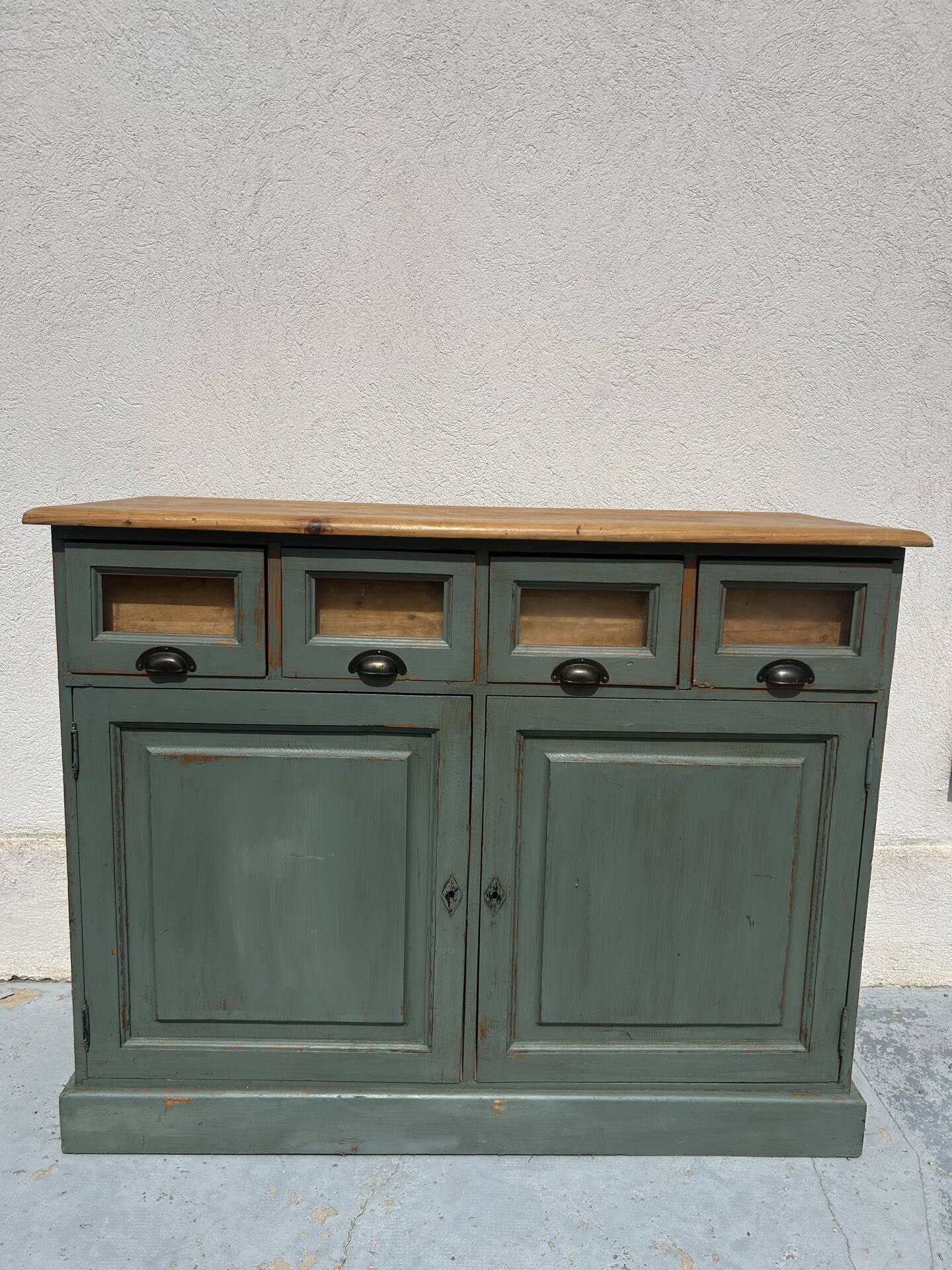 Antique counter cabinet with drawers and label holders – green patina