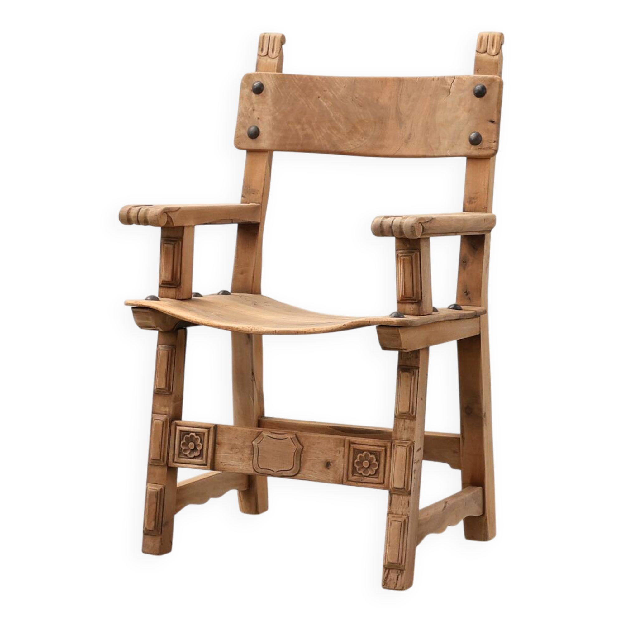 Brutalist armchair with carved rosettes and nailed wooden seat, Spain