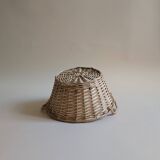 Round wicker basket in light wood