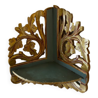 Old folding corner shelf in gilded wood with foliage decoration nineteenth period