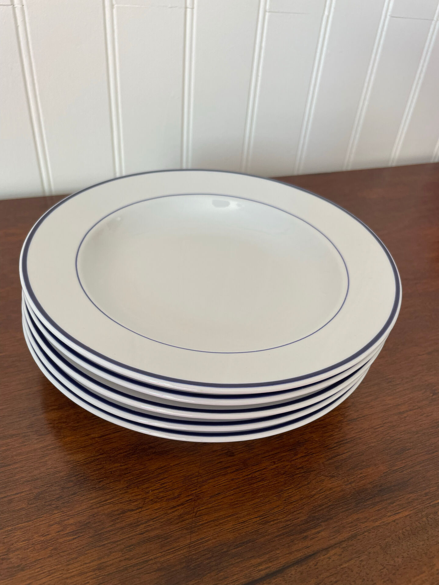 Set of 5 deep porcelain plates from Italy.