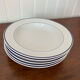 Set of 5 deep porcelain plates from Italy.