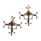 Pair of gilded metal sconces decorated with clovers.