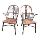 A pair of Windsor chairs in solid elm from the 1950s.
