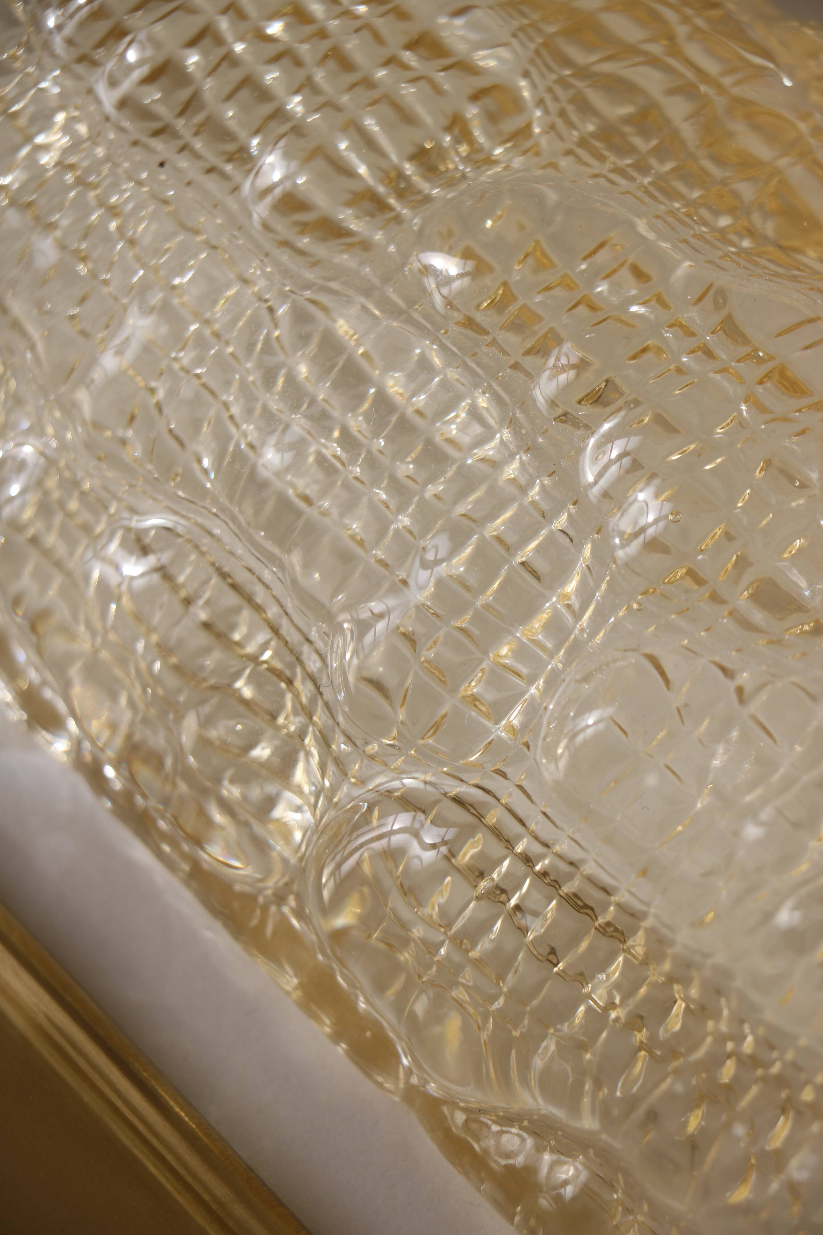 Glass and brass wall light by Carl Fagerlund for Orrefors, 1960.