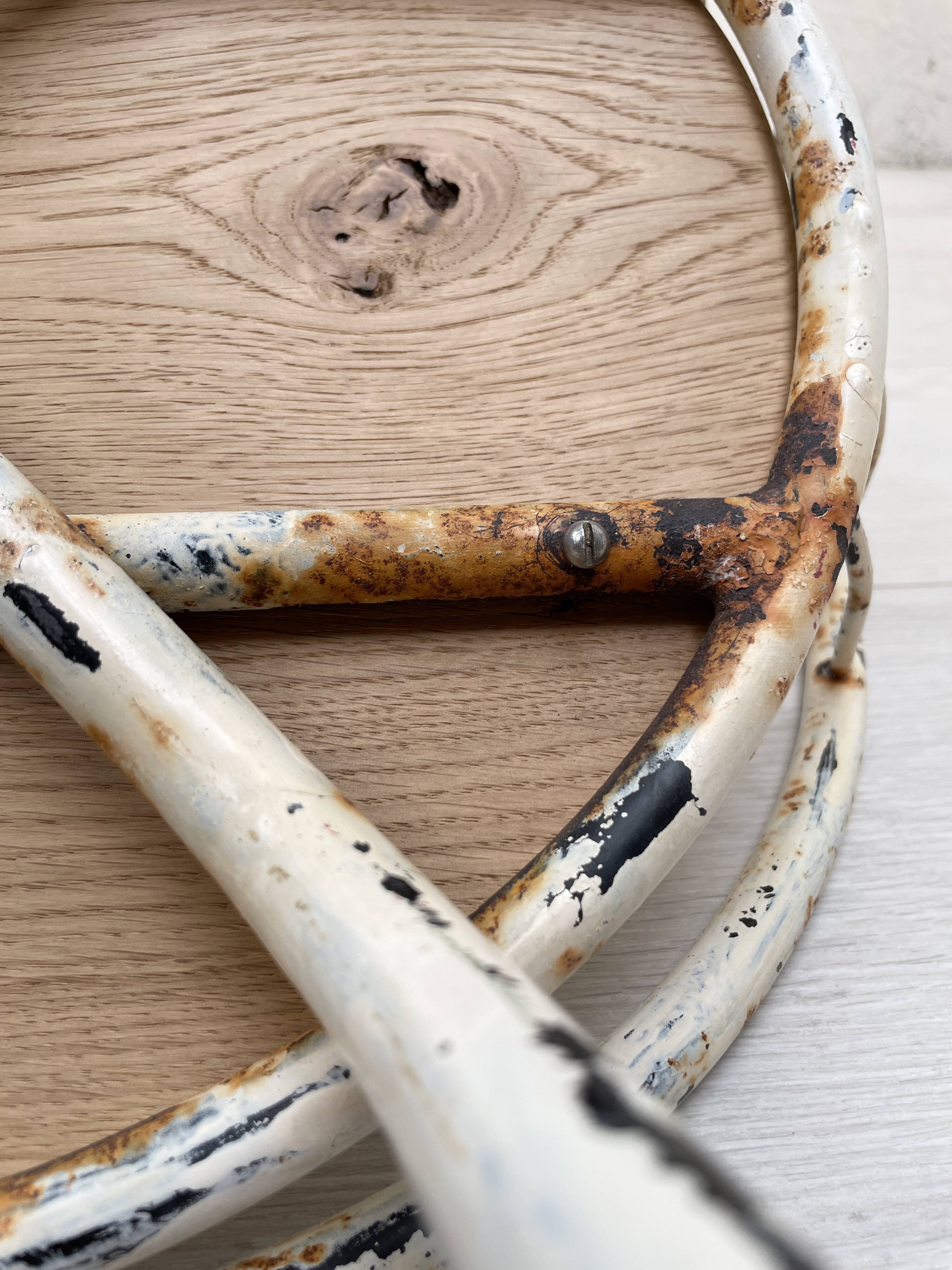 Basket armchair in metal and wood.