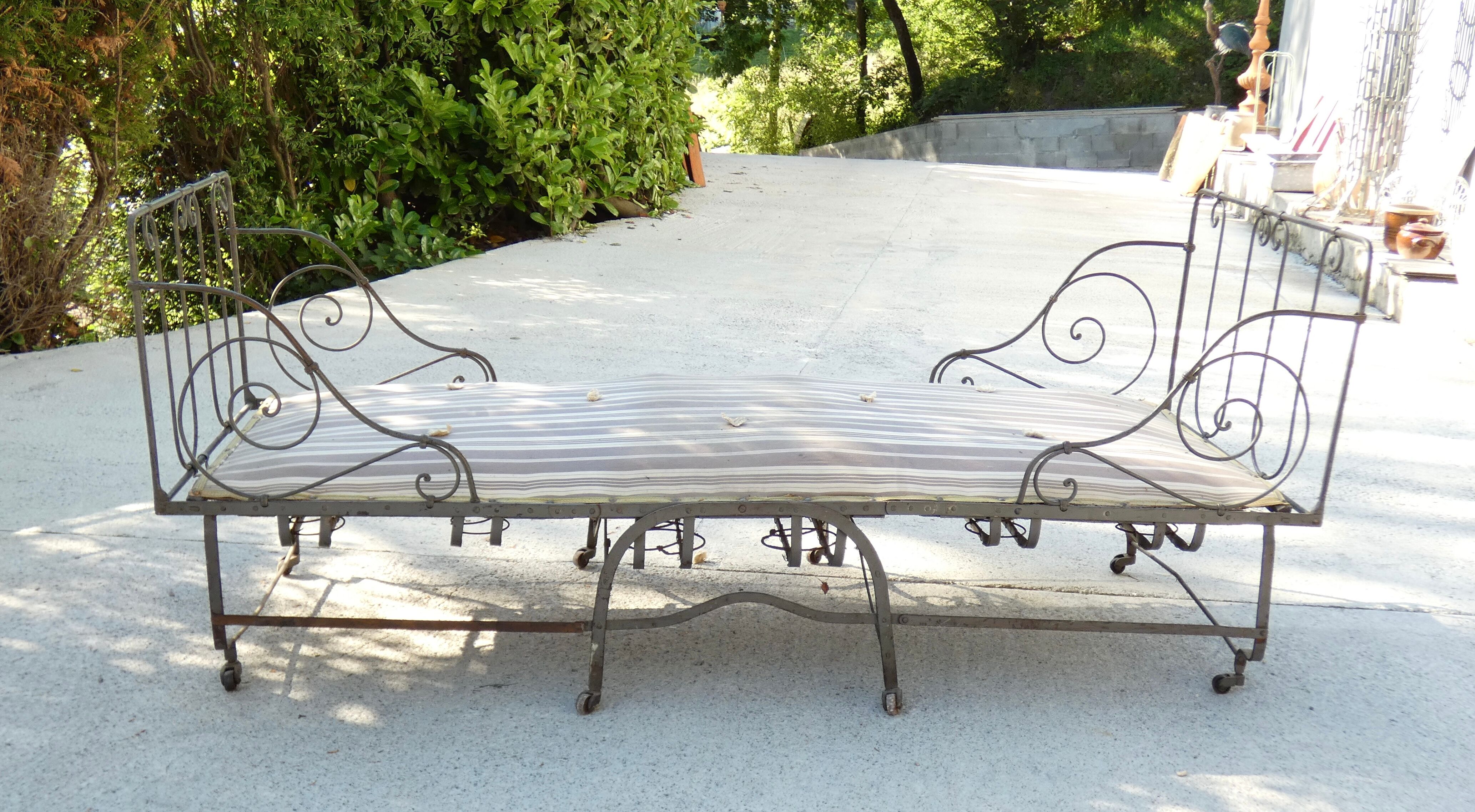 Folding wrought iron bed