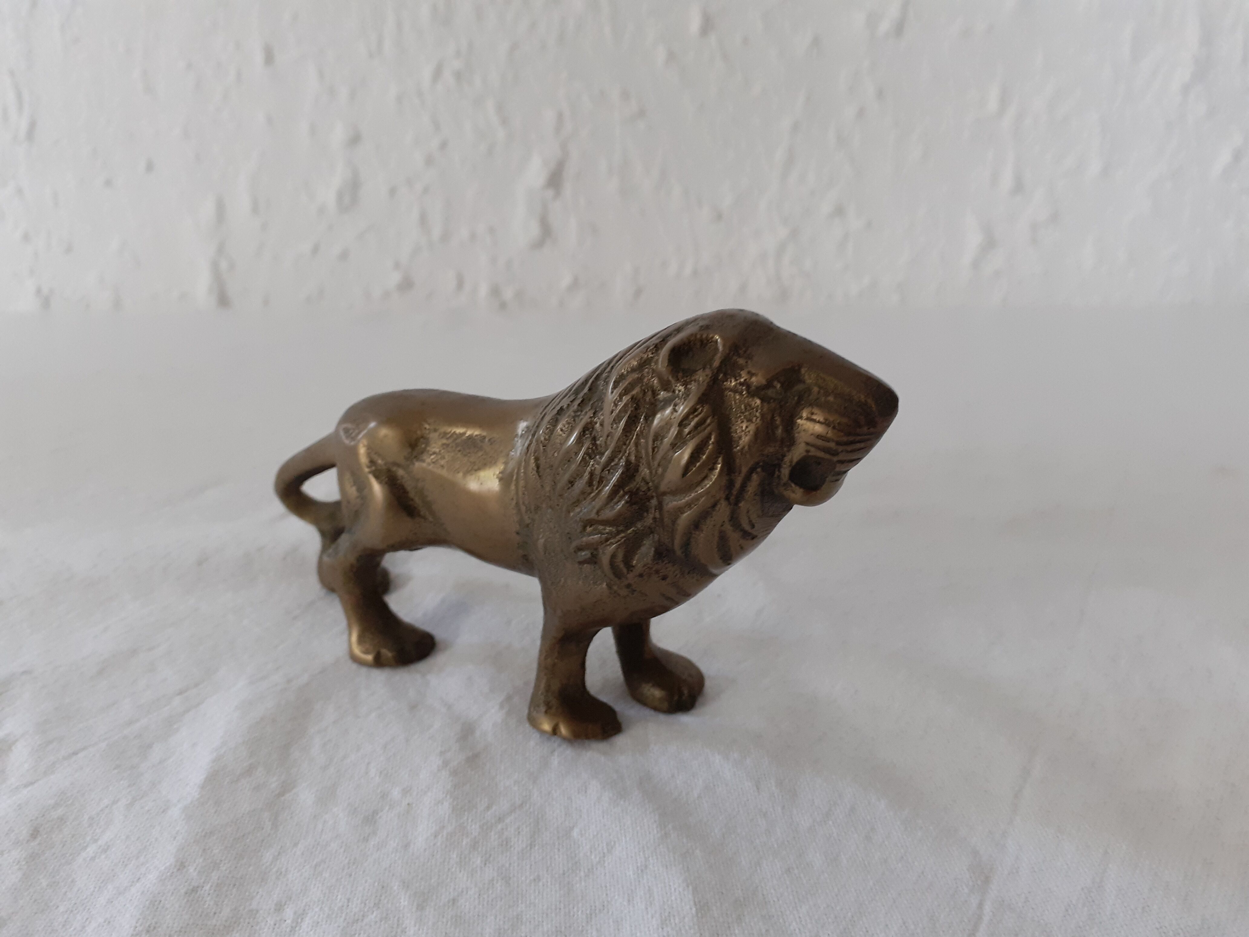 Animal lion in brass or bronze