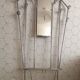 Vintage aluminum wall coat rack.