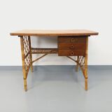 Vintage Louis Sognot desk in rattan and wood from the 1960s