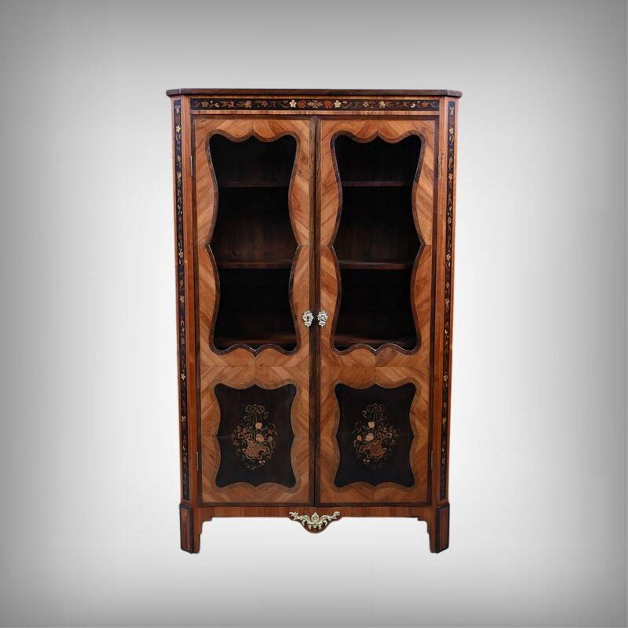 Showcase in precious wood marquetry, Louis XV Transition style.