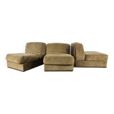 Three fabric lounge chairs 70s