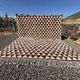 Very large Moroccan Berber rug in cream and burgundy 450x300 cm with a triangular pattern.