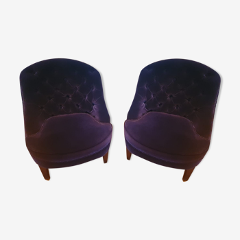 Lot de deux fauteuils capitonnés velours violet