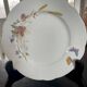 Set of 3 antique Longchamp ironstone dinner plates.