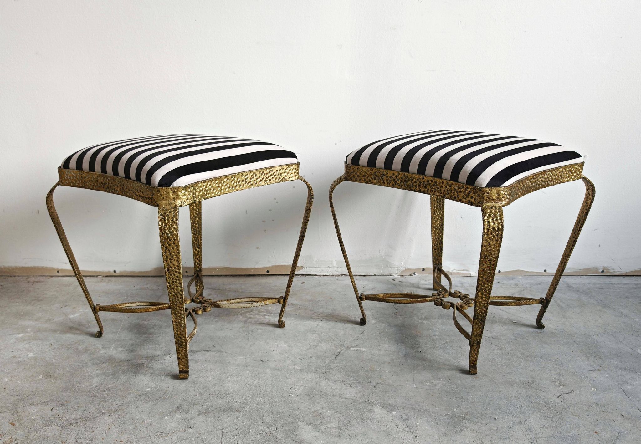 Pair of Mid Century Modern ottomans by Pier Luigi Colli from the 1950s.
