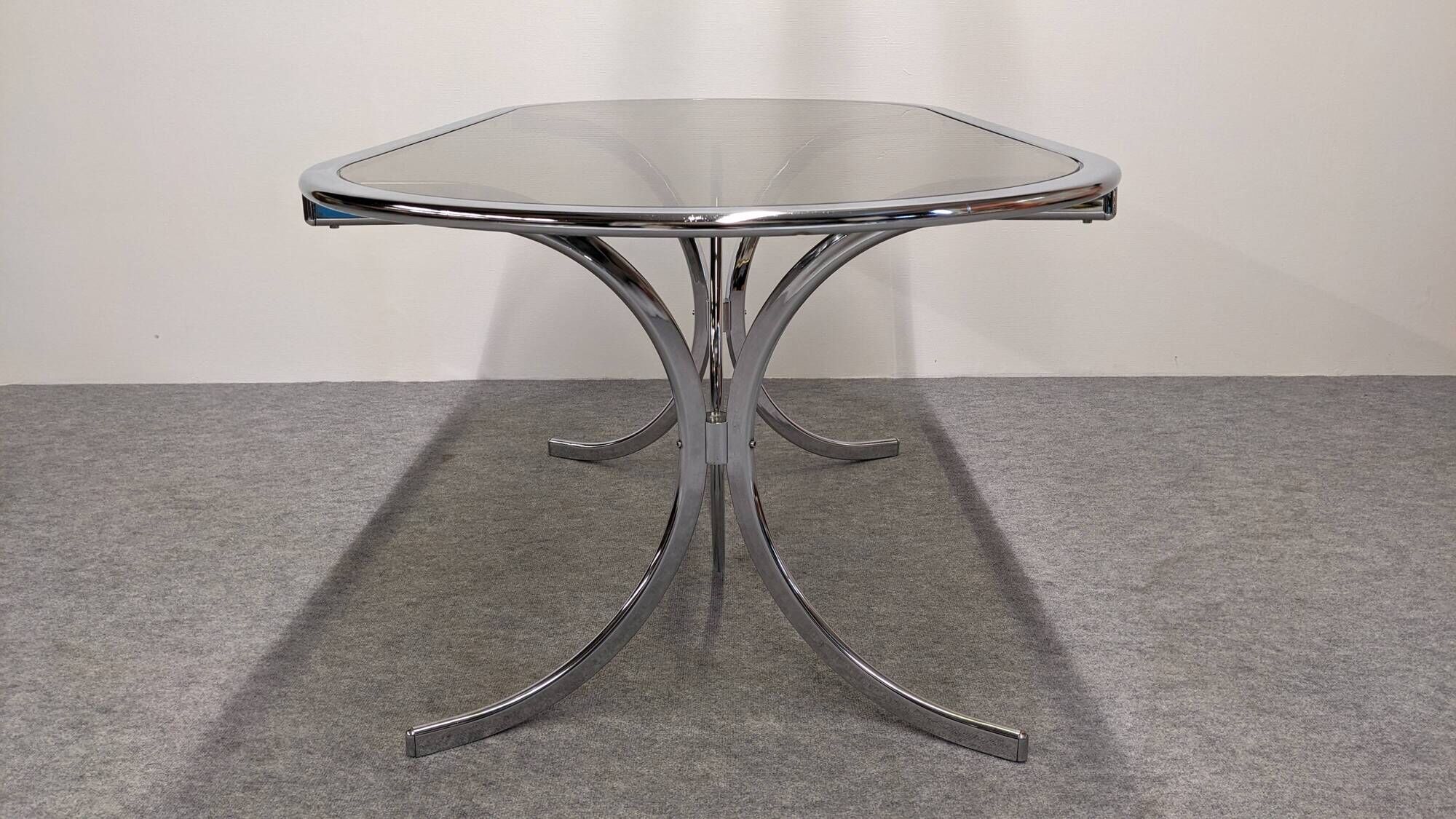 Oval dining table in chromed metal and smoked glass, Italy circa 1970