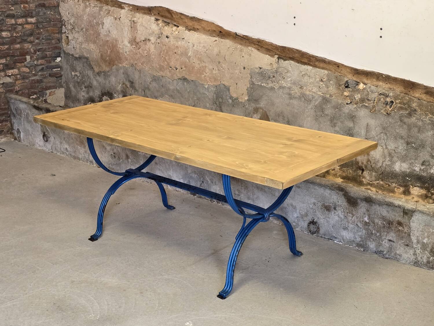 Wrought iron and solid wood table