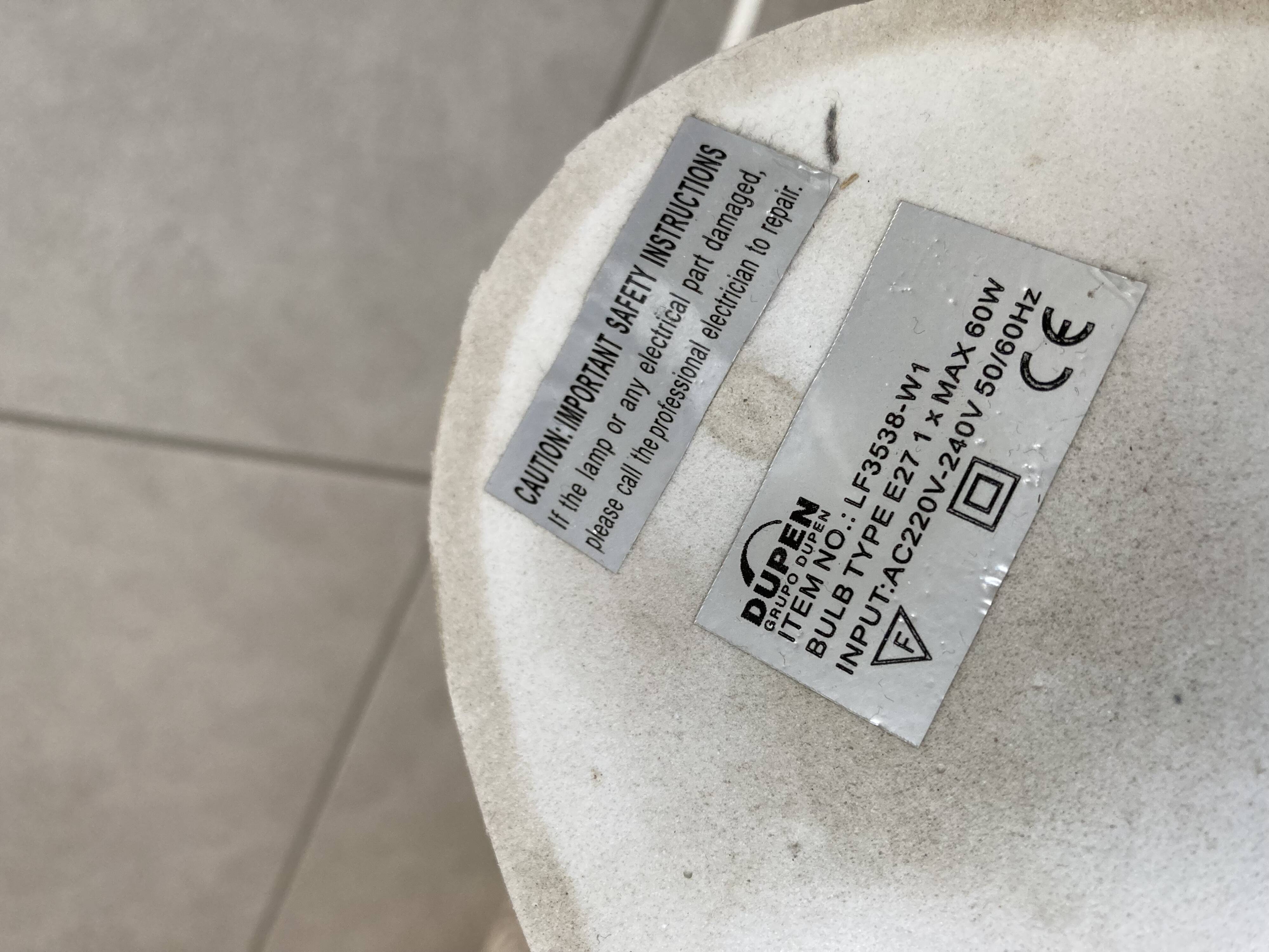 white lacquered metal reading lamp