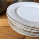 Lot of 28 porcelain plates with golden edging