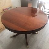 Round mahogany dining table