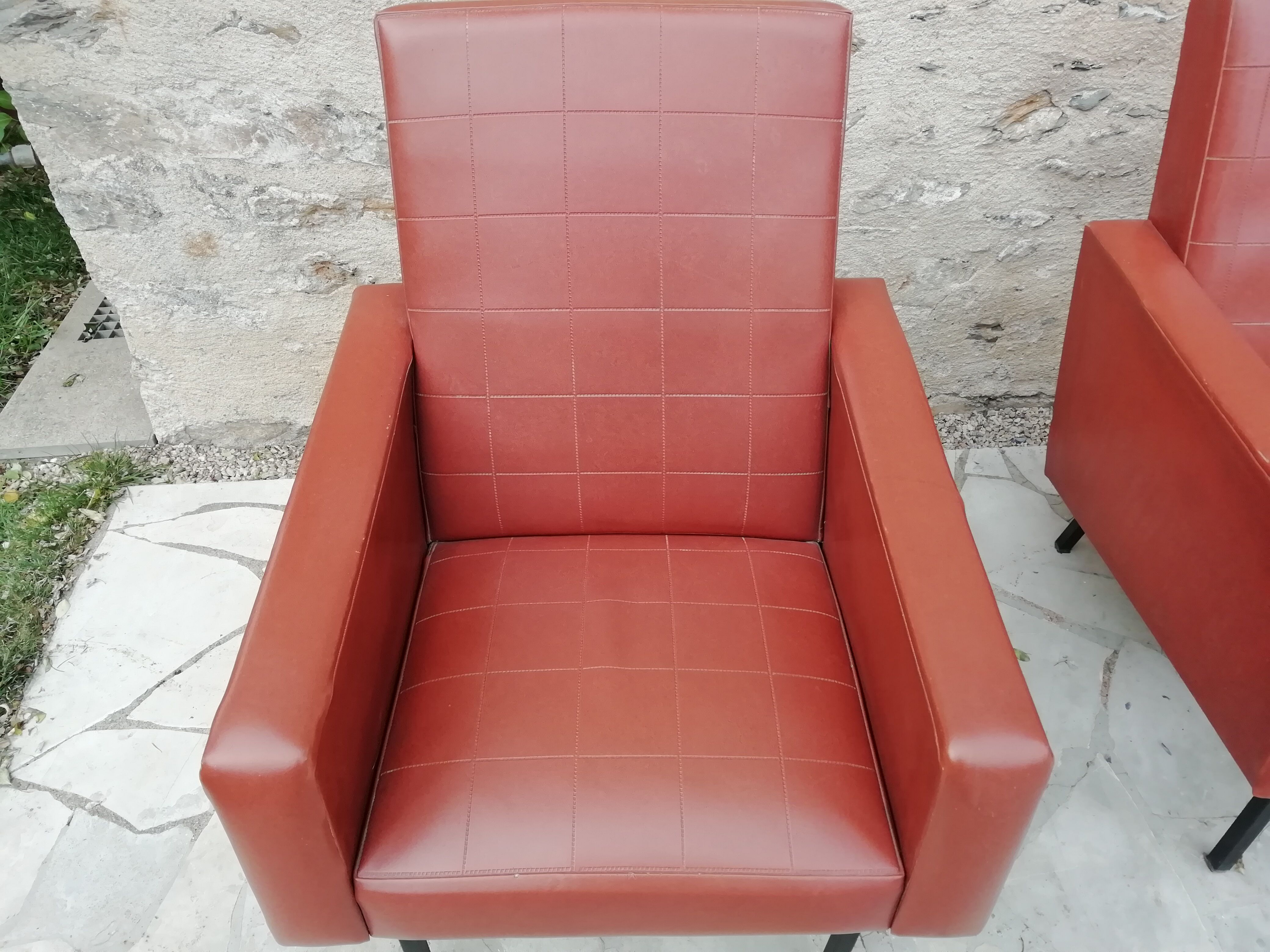 Pair of brown leather faux armchair