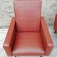 Pair of brown leather faux armchair