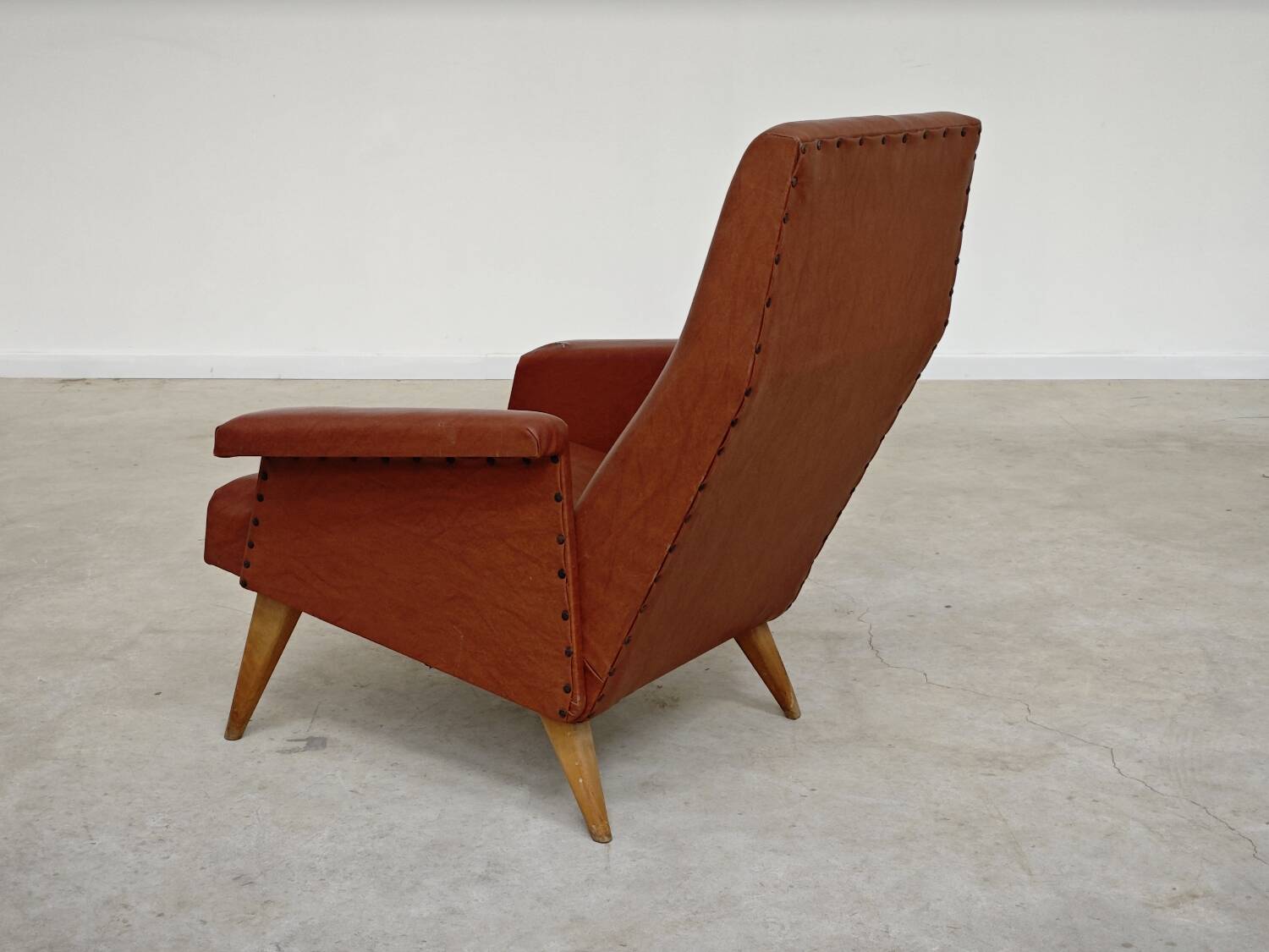 Camel brown imitation leather armchair, France 1960
