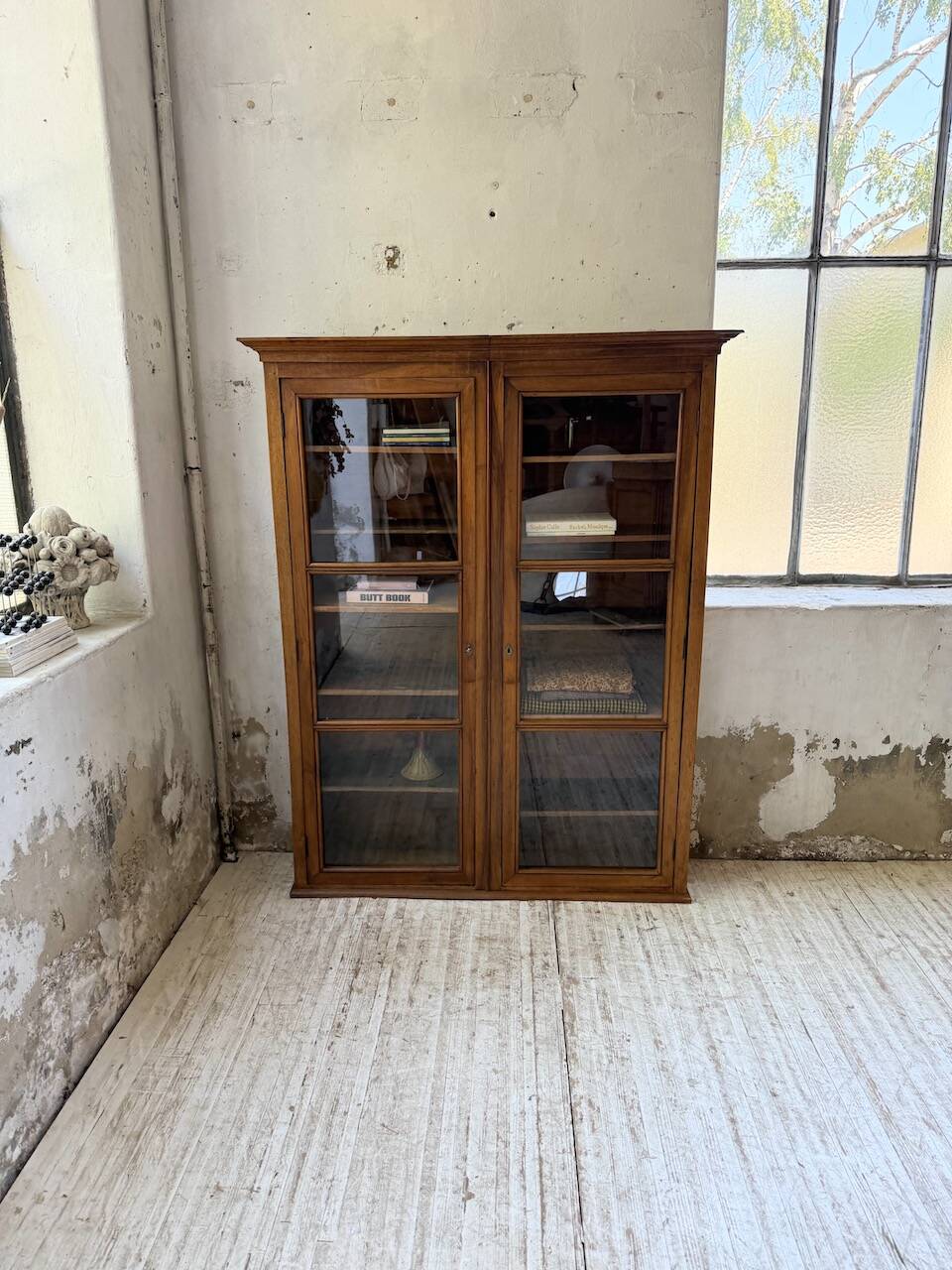 Glass-fronted walnut library 1900