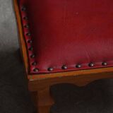 Danish sculpted oak stool from the mid-20th century with a red leather seat, 1950s.