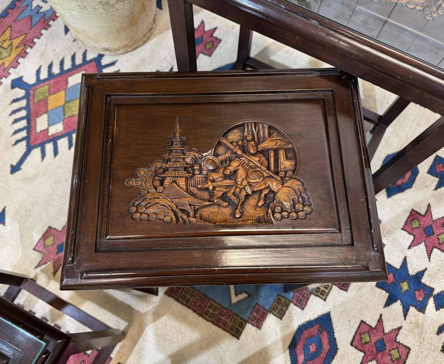Set of 4 Chinese nesting tables in teak from the 1980s.