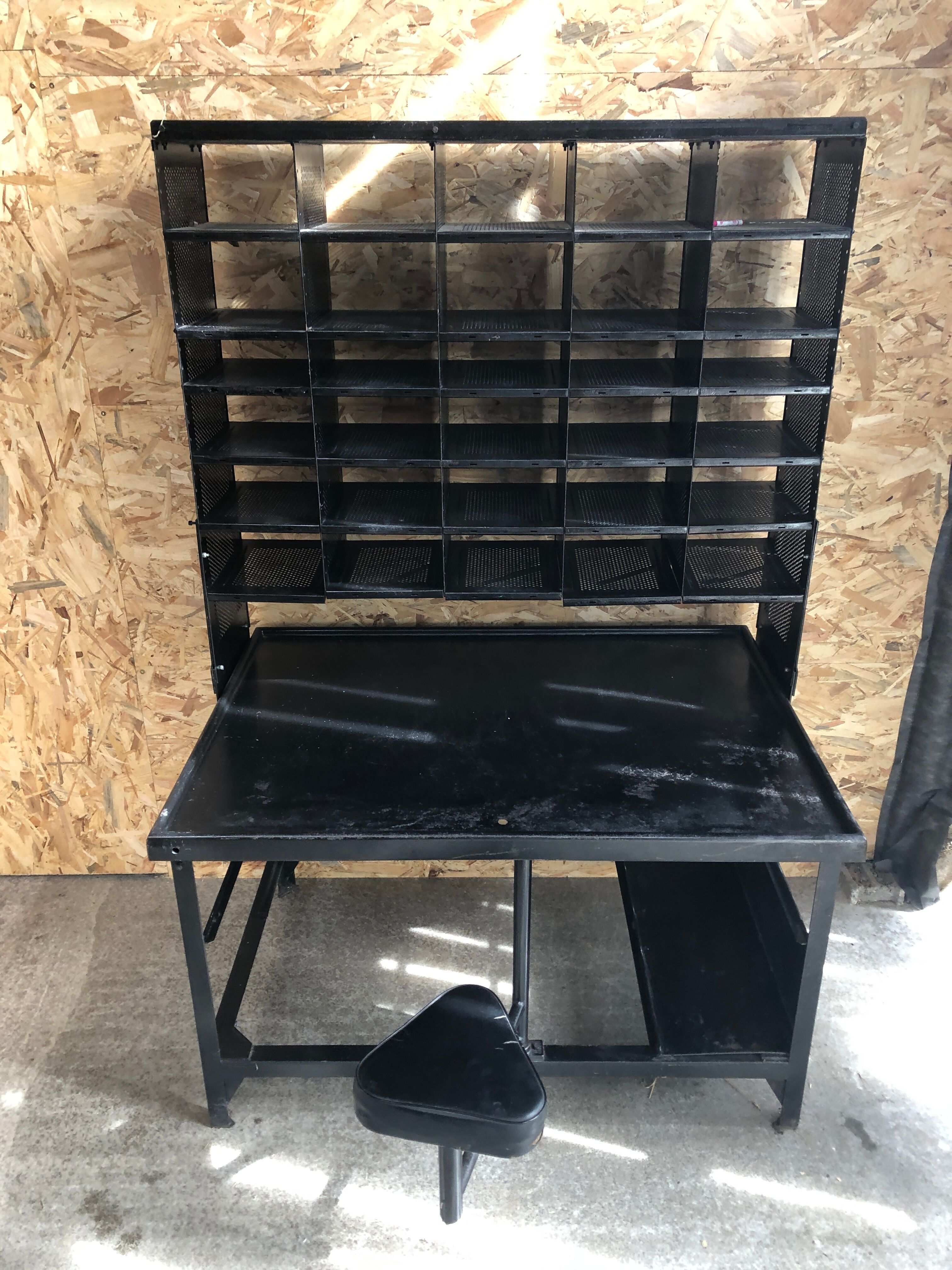 Old black metal postal sorting furniture + 30 perforated lockers + vintage stool