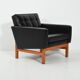 Swedish AB Futura teak and faux leather armchair