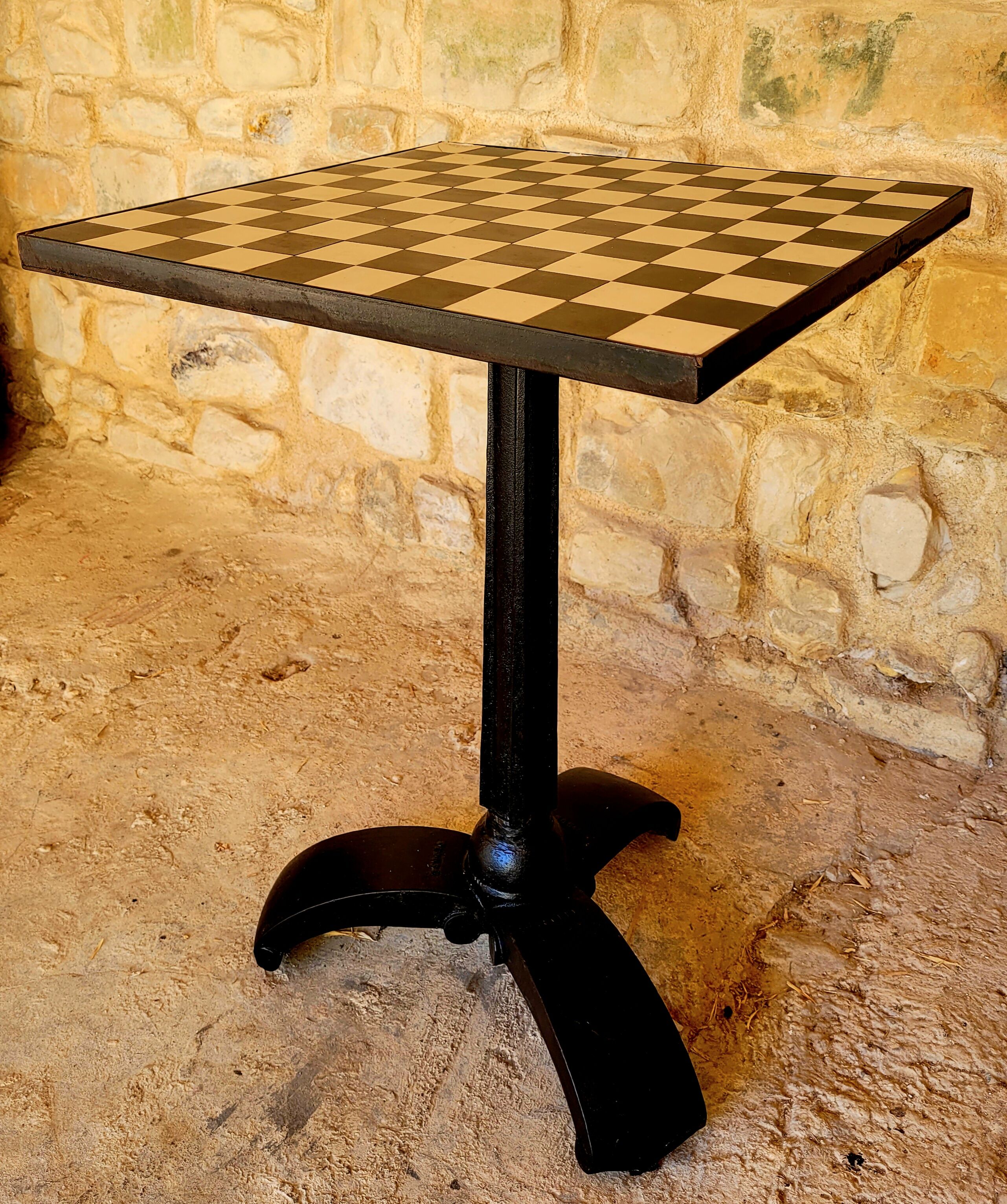 Old vintage bistro table brand Fischel in cast iron
