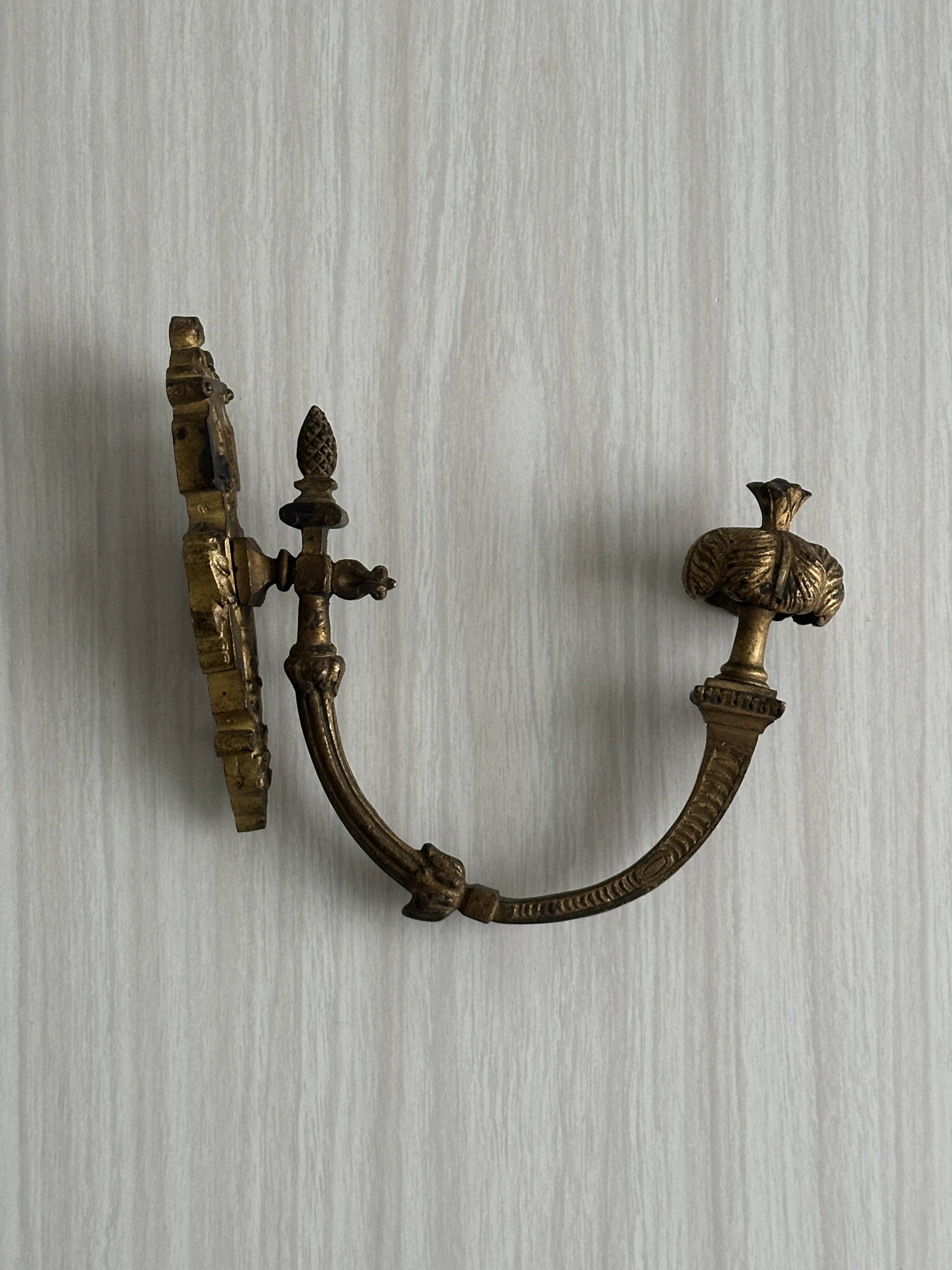 antique wall hook, gilded sculpted metal