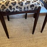 Pair of vintage wood and leopard chairs