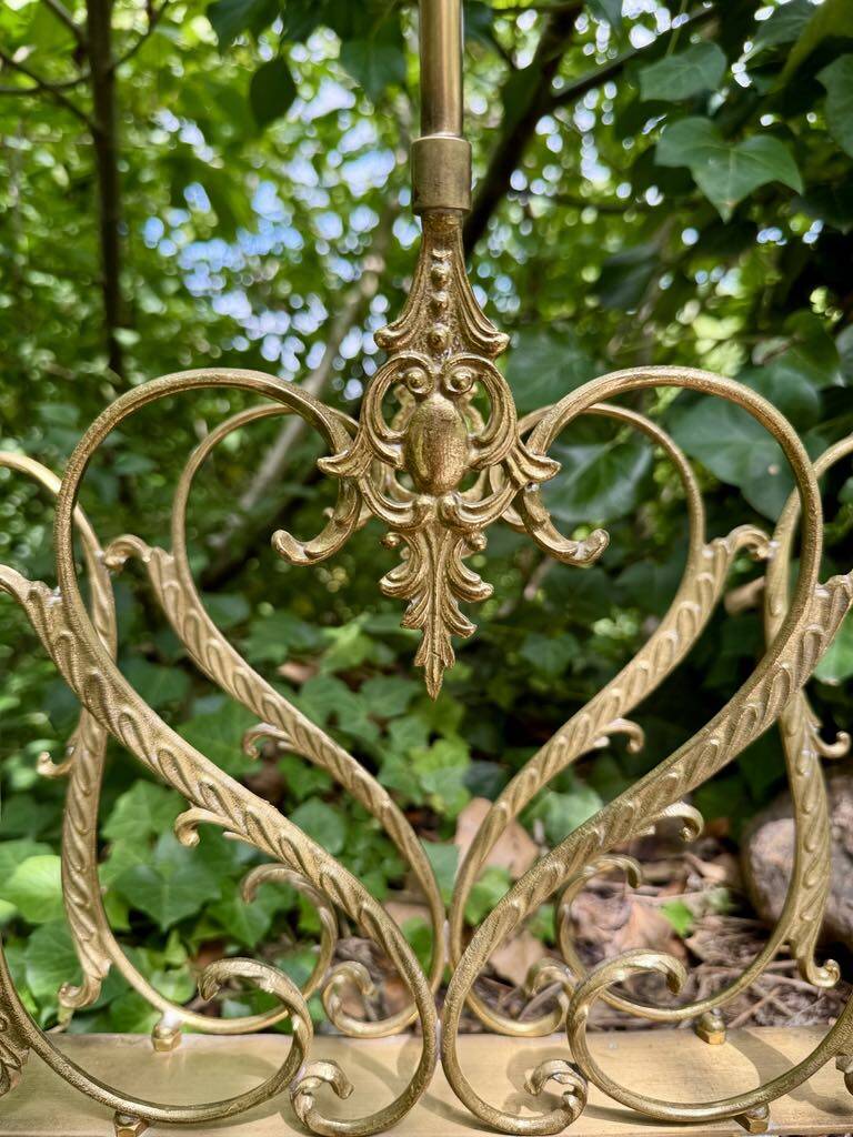 Brass magazine rack in baroque style