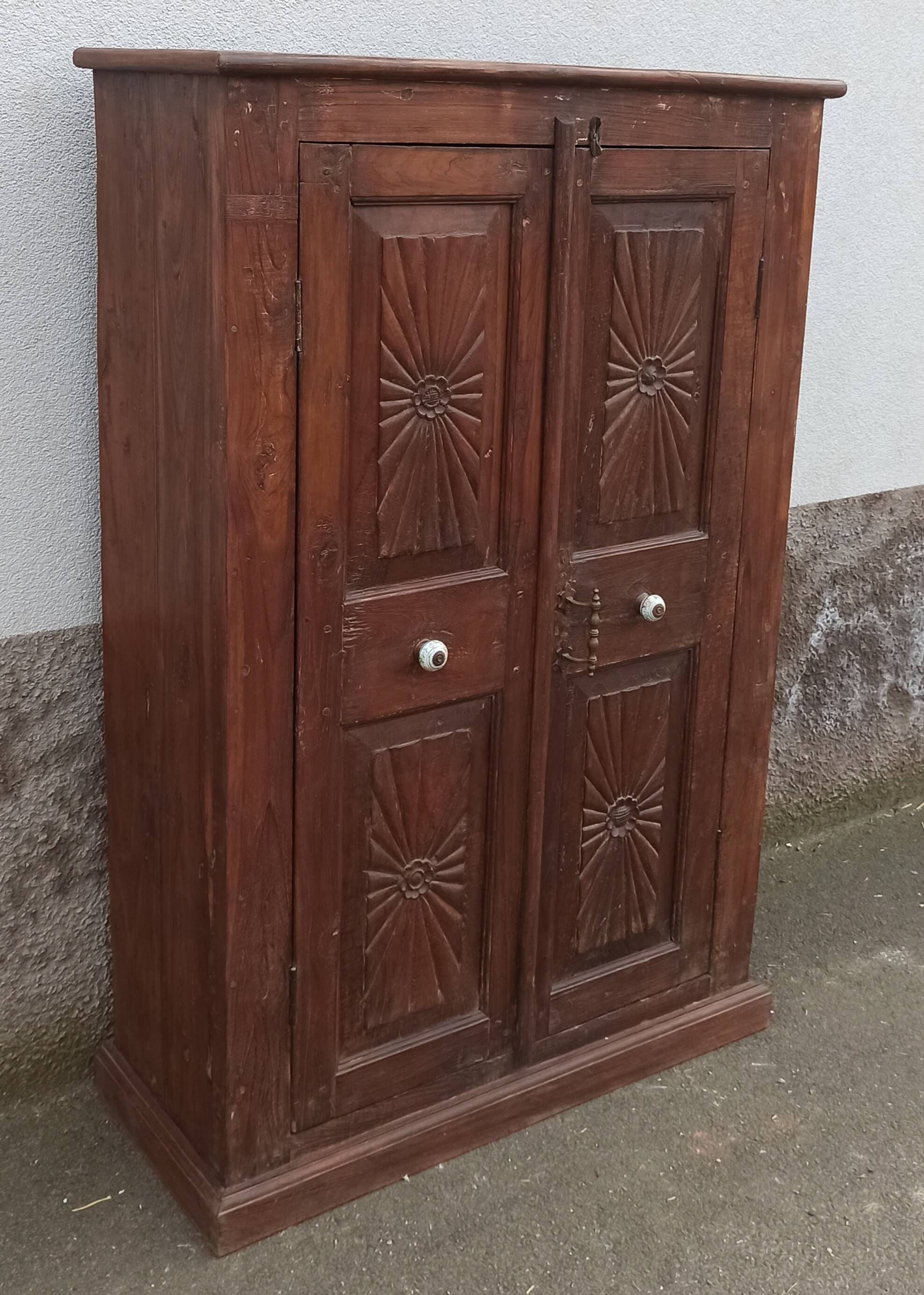 Old wooden cabinet with ceramic handles