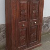 Old wooden cabinet with ceramic handles