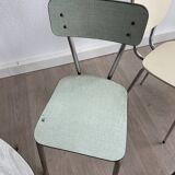 10 mismatched multicolored Formica chairs 60s