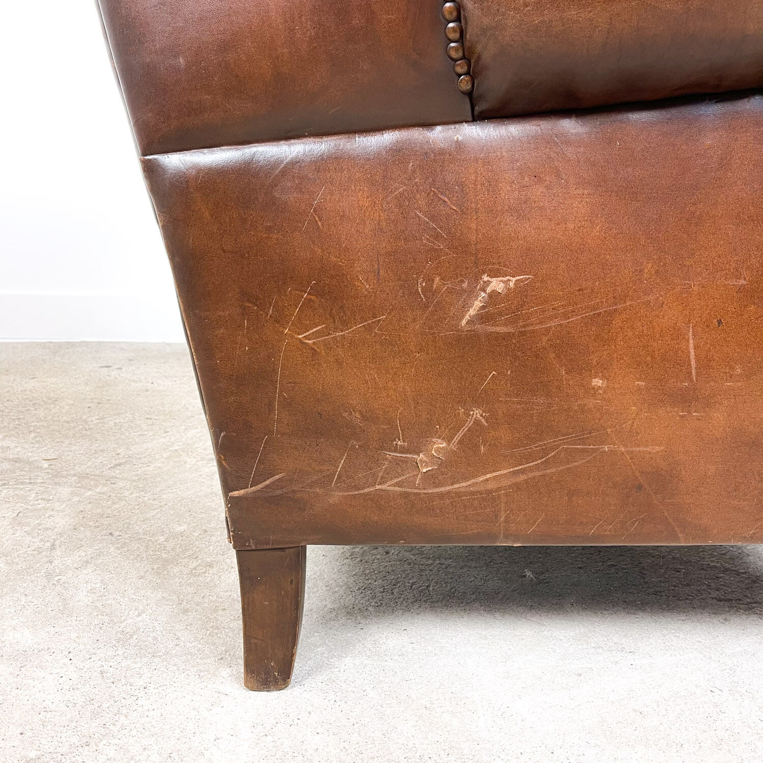 Dark brown sheep leather wingback armchair vintage